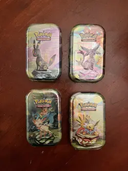 Pokemon TCG Prismatic Evolutions Mini Tin - 4 Factory Sealed Tins - Image 1