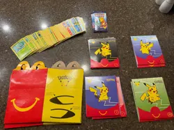 Pokemon 25th Anniversary 2021 McDonald’s Non Holo Promo Card and Toys 24/25 Set - Image 1