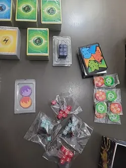 Pokemon Energy Card Lot - Unopened block Packages, Dice, Coins, 2 Empty Boxes - Image 3