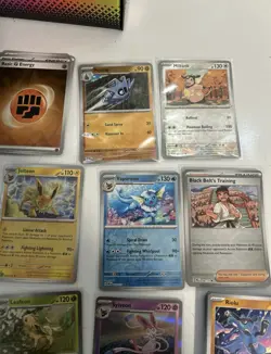 Pokemon Prismatic evolutions card lot with an assortment of bulk all NM+ - Image 2