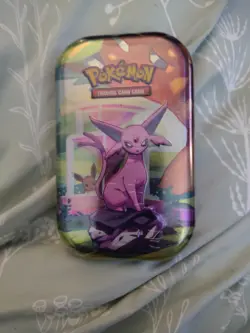 Pokemon TCG Scarlet & Violet Prismatic Evolutions Mini Tins Sealed - Image 1
