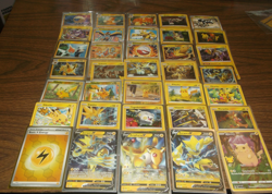 POKEMON 35 CARD ELECTRIC TYPE CHARACTER LOT INCLUDES 1 EX OR GX OR A "V" CARD - Image 1