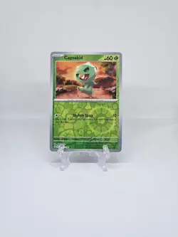 027/198 CAPSAKID | COMMON REVERSE HOLO | SCARLET & VIOLET POKEMON CARD - Image 1