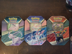 Pokemon TCG: V HEROES Tins Set of 3 Espeon, Sylveon, And Umbreon - Image 1
