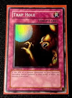 Trap Hole [LOB-E046] Super Rare 1st Edition Classic Yu-Gi-Oh! Card - Image 1