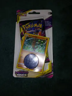 Sealed Pokemon Unified Minds Sudowoodo Holo Card with Coin and Booster Pack - Image 1