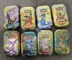 Pokemon Prismatic Evolutions Mini Tin Set 8 Pieces, Empty Tins No Packs Inside - Image 1