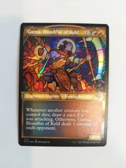 Garna, Bloodfist of Keld (Textured Foil) Dominaria United Foil - Image 1