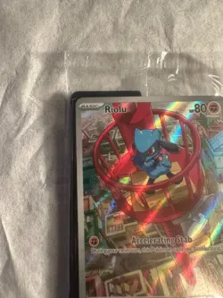Riolu 010 ETB Black Star Promo ME01: Mega Evolution - Pokemon NM - Image 2