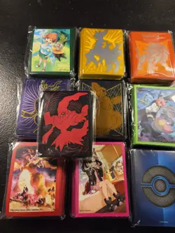 Pokemon TCG mixed lot Of 10 different graphics card sleeves Packs Of 65 - Image 1