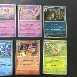 Pokemon TCG Prismatic Evolutions Costco Mini Tin Cosmos Promo Cards Set Of 8 - Image 2