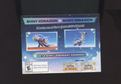 Pokemon Scarlet and Violet: Gamestop Shiny Miraidon/Koraidon Code Card - Image 1
