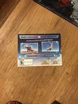 Shiny Koraidon Or Shiny Miraidon GameStop code card - Image 1