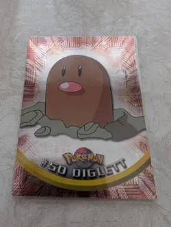 1999 Topps TV Animation Series 1 Pokemon Card Diglett #50 Blue Label HOLO - Image 1