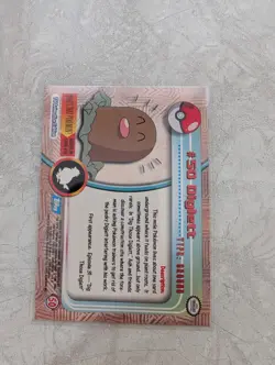 1999 Topps TV Animation Series 1 Pokemon Card Diglett #50 Blue Label HOLO - Image 2