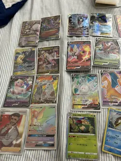 Pokemon Cards And Mini Binder - Image 1