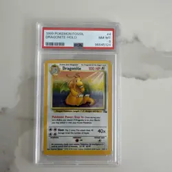 1999 Pokemon Fossil Dragonite Holo PSA 8 NM-MT 4/62 - Image 1