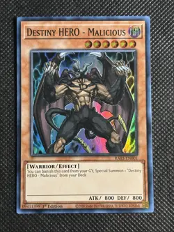 YuGiOh! Destiny HERO - Malicious RA03-EN001 Super Rare 1st Edition Near Mint - Image 1