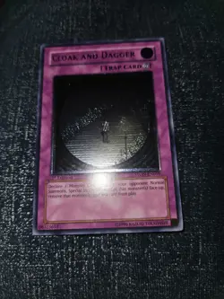 Yugioh Cloak And Dagger 1st Edition LP Ultimate Rare STON-EN059 - Image 1