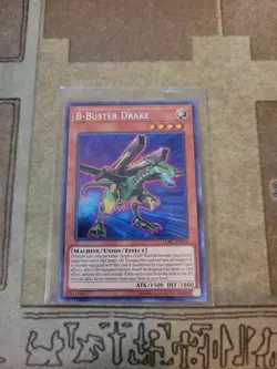 YUGIOH B-BUSTER DRAKE LCKC-EN020 SECRET UNLIMITED ED NM - Image 1