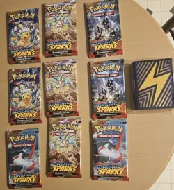 Pokemon TCG Surging Sparks Factory Sealed Booster Packs X 9 /Plus Sleeves - Image 1