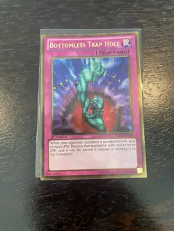 Yugioh Bottomless Trap Hole PGLD-EN069 Gold Rare 1st Ed NM - Image 1