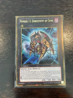 Yugioh Number 13: Embodiment Of Crime PGLD-EN023 Gold Secret Rare 1st Ed NM - Image 1