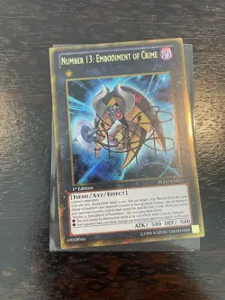 Yugioh Number 13: Embodiment Of Crime PGLD-EN023 Gold Secret Rare NM - Image 1