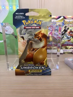 POKEMON Sun & Moon UNBROKEN BONDS Sleeved Booster RESHIRAM CHARIZARD New SEALED - Image 1