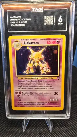 ALAKAZAM TAG 6 EX-MT 2000 POKEMON HOLO BASE II # 1/130 - Image 1