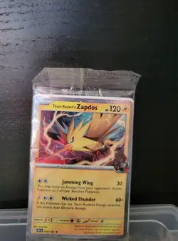 Team Rocket's Zapdos (Gamestop Stamped) Promo Card - Image 1