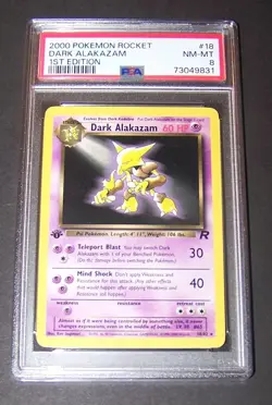 2000 Pokemon Team Rocket Dark Alakazam Card #18, 1st Edition PSA 8, NM-Mint - Image 1