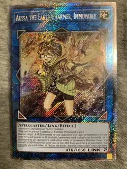 YuGiOh Aussa the Earth Charmer, Immovable RA04 Quarter Century Stampede Platinum - Image 1