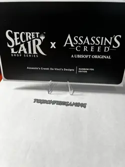 Assassin's Creed Raindbow Foil Secret Lair Da Vinci's Designs In Hand - Image 3