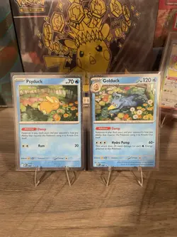 Pokemon TCG Mega Evolutions Psyduck 007 - Golduck 008 Black Star Promo - Image 1