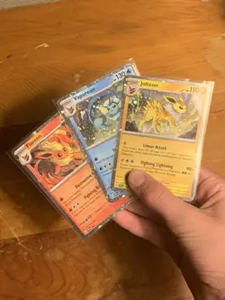 Pokemon TCG Cosmic Holo Jolteon Vaporeon Flareon Black Star Promo Set Of Three - Image 1