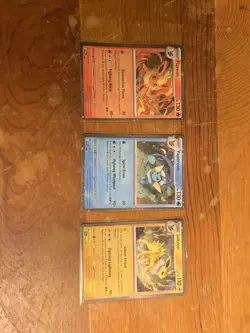 Pokemon TCG Cosmic Holo Jolteon Vaporeon Flareon Black Star Promo Set Of Three - Image 2