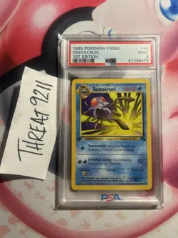 PSA 9 Tentacruel 44/62 Fossil First Edition Pokemon Card - Image 1