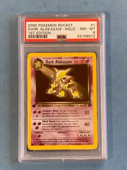 PSA 8 Pokemon 1st Edition Team Rocket Rare Holo Dark Alakazam - 1/82 - Image 1