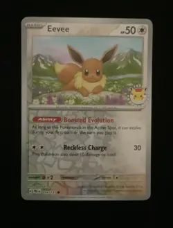 Eevee - (Pokemon Day 2025) (Reverse Cosmos Holo) 074/131 - Image 1