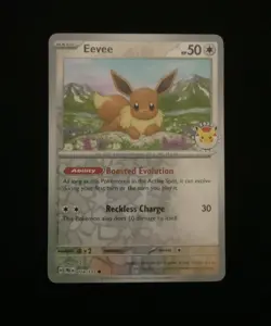 Eevee - (Pokemon Day 2025) (Reverse Cosmos Holo) 074/131 - Image 1