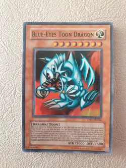YUGIOH BLUE-EYES TOON DRAGON SUPER RARE DB1-EN066 NM - Image 1