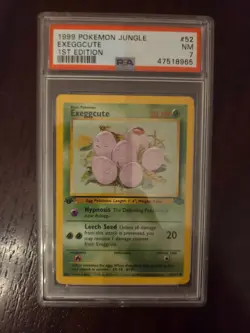 PSA 7 NM/MT 1999 POKEMON JUNGLE #52 EXEGGCUTE 1ST EDITION ENGLISH - Image 1