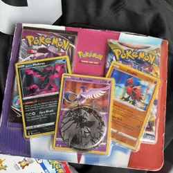 Pokemon TCG: Moltres, Articuno & Zapdos Cards with 2 Booster Packs & Coin - Image 1