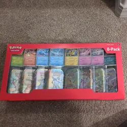 Pokemon TCG: Scarlet & Violet - Prismatic Evolutions 8 Pack Mini Tin Set - Image 1