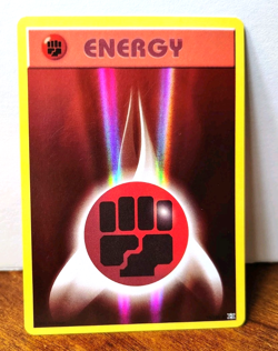 POKEMON FIGHTING ENERGY 96/108 REVERSE HOLO EVOLUTIONS MP-LP - Image 1