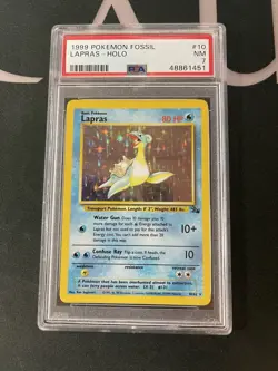 1999 POKEMON FOSSIL #10 LAPRAS-HOLO PSA 7 - Image 1