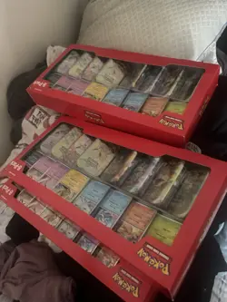 Pokemon Prismatic Evolutions 8 Mini-Tins with Promo Cards - Image 1