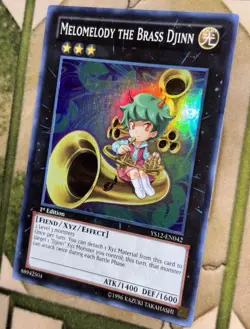 YuGiOh MELOMELODY THE BRASS DJINN Super Rare YS12-EN042 - Image 1