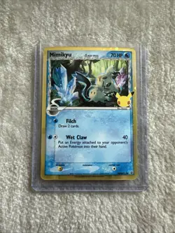 Pokemon Card Mimikyu SWSH136 Delta Species 25th Celebrations Black Star Promo - Image 1